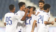 Al Khor’s players celebrate their huge win over Al Duhail.
