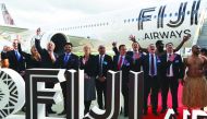Fiji Airways CEO and managing director Andre Viljoen (C), DAE Capital president Dave Houlihan (C-R), Airbus Chief Commercial Officer Christian Scherer (3rd from R), Fiji Minister for Economy, Civil Service and Communication Aiyaz Sayed-Khaiyum (4th from L