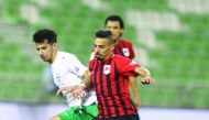 Al Rayyan and Al Ahli players vie for ball possession during their Ooredoo Cup Round 2 match at Al Ahli Stadium, on Friday in this file picture.