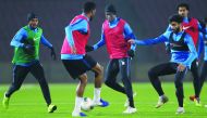 Qatari players in action during a practice session on the eve of today’s 2022 FIFA World Cup and 2023 Asian Cup joint qualifier against Afghanistan.