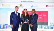 Lauren Djedid, Senior Legal Counsel, QFC, with hosts of the Forum awards. 