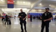 Atlanta police officers patrol at the check-in area as they carry sub-machine guns at Hartsfield-Jackson International Airport in Atlanta, Georgia, November 17, 2015. Reuters / Tami Chappell
