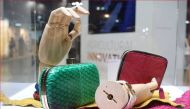 Luxury handbags made with fish skin leather by Brazilian designer Barbara della Rovere, seen at the Seeds & Chips food summit in Milan, Italy, on May 6, 2019. Thomson Reuters Foundation/Thin Lei Win.