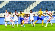 Action during the Ooredoo Cup Group B match between Al Gharafa and Al Arabi yesterday. The match ended in a one-all draw.
