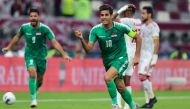 Iraqi forward Alaa Abdul-Zahra celebrates after scoring  against United Arab Emirates during the 24th Arabian Gulf Cup Group A match at the Khalifa International Stadium in  Doha, yesterday.