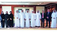 H E Saad Sherida Al Kaabi (centre), Minister of State for Energy Affairs and the President and CEO of Qatar Petroleum, with Fahad bin Hamad Al Muhannadi (fifth left), Chairman of the Board of Directors of Nebras Power, and other officials during the event
