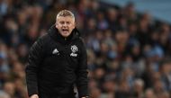 Manchester United's Norwegian manager Ole Gunnar Solskjaer reacts on the touchline during the English Premier League football match between Manchester City and Manchester United at the Etihad Stadium in Manchester, north west England, on December 7, 2019.