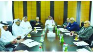 Qatar Chamber Second Vice-Chairman and Chairperson of the Committee Rashid bin Hamad Al Athba, with other QC officials during the review meeting in Doha recently. 