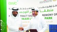 Fahad Rashid Al Kaabi (right), CEO of Manateq, shaking hands with Sheikh Abdulla bin Fahad bin Jassem bin Jabor Al Thani, Chairman of GWC, during the signing ceremony at Manateq head office in Doha yesterday. Pic: Abdul Basit/the peninsula