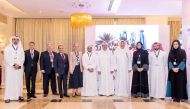 Omar Hussain Alfardan, Board Member and Managing Director, Commercial Bank; Joseph Abraham, Group CEO; and other officials posing for a group picture on the sidelines of  The Euromoney Qatar Conference.