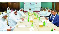 Members of the Qatar-Malaysian Joint Business Council holding a meeting yesterday at QC headquarters. 