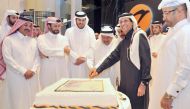 Qatar Central Bank Governor H E Sheikh Abdulla bin Saoud Al Thani joins al khaliji Chairman and Managing Director, Sheikh Hamad bin Faisal bin Thani Al Thani; Sheikh Faisal bin Qassim Al Thani; and other officials for cutting a cake to mark the formal ope