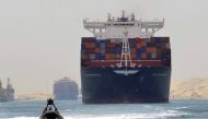 A cargo ship is seen crossing through the New Suez Canal, Ismailia, Egypt, July 25, 2015. Reuters