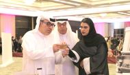 Alfardan Group Chairman Hussain Ibrahim Alfardan (centre); the President and CEO of Alfardan Group Omar Hussain Alfardan (left), and the PR and Communications Manager of Alfardan Group, Sara Fahad Alfardan, during the event.