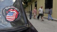 A car with a sticker of The Rolling Stones in the streets of Havana, Cuba, March 18,  2016.  EPA / Ernesto Mastrascusa