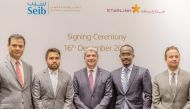 The Seib Insurance and Reinsurance Company and Starlink Qatar officials during the signing ceremony.