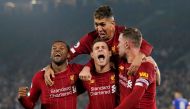 Liverpool's James Milner celebrates scoring their second goal with teammates (REUTERS/Andrew Yates)