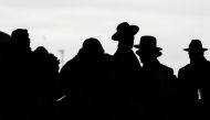 Orthodox Jews arrive during the 13th Siyum HaShas, a celebration marking the completion of the Daf Yomi, a seven-and-a-half-year cycle of studying texts from the Talmud, the canon of Jewish religious law, at the MetLife Stadium in East Rutherford, New Jer