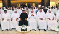 Minister of Commerce and Industry H E Ali bin Ahmed Al Kuwari (third right), Qatar Chamber Chairman Sheikh Khalifa bin Jassim Al Thani (third left), with other officials, during a press conference at the Ministry of Commerce and Industry headquarters in L