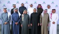 H E Saad Sherida Al Kaabi (third right, front), the Minister of State for Energy Affairs, the President and CEO of Qatar Petroleum; Issa Shahin Al Ghanim (third left, front) with QP officials during the farewell event.