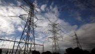 Electricity pylons of high-tension electricity power lines are seen in Galapagar, Spain, January 20, 2017. Reuters / Juan Medina