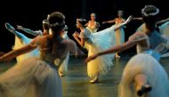 Ballet dancers perform during a rehearsal before the opening night of a ballet production at the Municipal Theater in Rio de Janeiro, Brazil, June 20, 2018. AFP / Carl De Souza