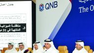 H E Ali bin Shareef Al Emadi (second right), Chairman of QNB Group, who is also the Minister of Finance, addressing the AGM of the bank at Sharq Village and Spa, in Doha yesterday, as Deputy Chairman Sheikh Fahad bin Faisal Al Thani (third left); Group CE