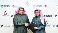 Yousef Ali Darwish (left), General Manager - QNB Group Communications; and Qatar Chamber’s Director-General, Saleh bin Hamad Al Sharqi, during the signing ceremony.