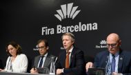 (FromL) Mayor of Barcelona Ada Colau, Chairman of the Board of Administration of Fira de Barcelona Pau Relat, GSMA director general Mats Granryd and GSMA chief executive officer John Hoffman arrive to give a press conference in Barcelona on February 13, 2