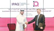 Investment Promotion Agency’s CEO Sheikh Ali Alwaleed Al Thani (left) and iQ’s Director of Operations, Nick Crawley, during the signing ceremony held at the Ministry of Commerce and Industry. 