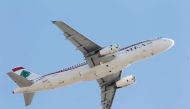 FILE PHOTO: A Lebanese Middle East Airlines (MEA) Airbus A320-200 plane flies over Beirut, Lebanon January 12, 2017. REUTERS/Mohamed Azakir