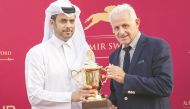 Asian Equestrian Federation and Qatar Equestrian Federation President, Hamad bin Abdulrahman Al Attiya (left), presenting the Al Zubara trophy to Alban Elie Marie De Mieulle, trainer of winner Mehdi, at the Al Rayyan Park yesterday