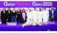 Players and officials posing for a photograph following the Qatar Total Open 2020 draw ceremony.