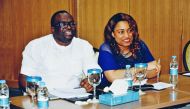 Viktor Ikoli (left), President of NIDO-Qatar, with a member of the community during the meeting.
