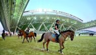 Riders and horses at the state-of-the-art Longines Arena at Al Shaqab in this file photo.
