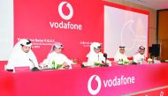 Vodafone Qatar’s Chairman Abdulla bin Nasser Al Misnad (centre), board members and Vodafone Qatar CEO, Sheikh Hamad Abdulla Jassim Al Thani (left), during the Ordinary General Assembly Meeting, yesterday. 
