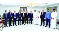 The Chairman of the Turkish-Qatari Parliamentary Friendship Group, MP Vahit Kiler, and other members of the delegation posing for a group picture with the officials of Qatar Chamber, yesterday.  
