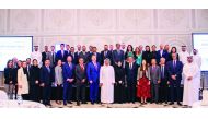 Yousuf Mohamed Al Jaida (centre), CEO, QFC Authority, and other senior QFC officials, posing for a group picture with ambassadors and senior diplomats from several countries, after the at ‘Ambassador Roundtable’ meeting, yesterday. 