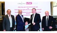 UDC Chairman Turki bin Mohammed Al Khater (second left), shaking hands with Simon Naudi, CEO of Corinthia Hotels Limited (CHL), after signing the agreement at Corinthia London, in the UK, on February 27. Ibrahim Jassim Al Othman (left), President, CEO and