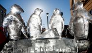 A Greenpeace ice sculpture of penguins is seen during a protest by students against climate change in central Brussels, Belgium February 7, 2020. Reuters/Francois Lenoir
 