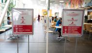 Signs in Chinese, French and English are posted for visitors and staff at the Jewish General Hospital in Montreal, Quebec, Canada March 2, 2020. Reuters/Christinne Muschi