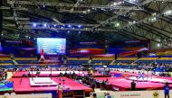FIle picture of contestants competing in men's parallel bars qualification during the first of the 2018 FIG Artistic Gymnastics Championships at Aspire Dome in Doha. 