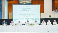 Dr. Mohammed bin Saleh Al Sada (centre), Chairman of Nakilat Board; Abdullah Al Sulaiti (left), Chief Executive Officer, Nakilat; and other Board Members of Nakilat during the Annual General Meeting, yesterday.