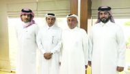 QIC Group President Khalifa Abdulla Turki Al Subaie (second right); Ali Al Fadala (second left) and other officials during the farewell ceremony.