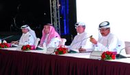 Commercial Bank Chairman Sheikh Abdulla bin Ali bin Jabor Al Thani (right); Vice-Chairman of Commercial Bank, Hussain Alfardan (second left) and other Board members during the  Ordinary General Assembly Meeting of the bank, yesterday.