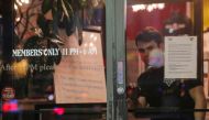 FILE PHOTO: An employee exits Harbor Fitness, following the citywide order to close gyms in the wake of the outbreak of coronavirus (COVID-19), in the Brooklyn borough of New York, U.S., March 16, 2020. REUTERS/Brendan McDermid/File Photo