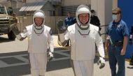 This handout photo released by NASA shows NASA astronauts Douglas Hurley, left, and Robert Behnken, wearing SpaceX spacesuits. (AFP / NASA / Bill INGALLS)
