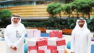 Dr Ahmed Al Hammadi (left) with Sheikh Faisal bin Hamad Al Thani during the presentation of gifts for Sidra Medicine’s young patients recently. 