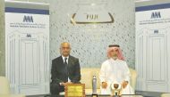 Dr Nasser Abdulghani Al Abdulghani (right), Chairman of Abdullah Abdulghani & Bros Co (AAB), and R K Murugan, Acting CEO of AAB with the most prestigious awards the company has received.