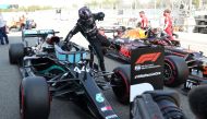 Mercedes' Lewis Hamilton gets out the car after qualifying in pole position REUTERS/Albert Gea/Pool
